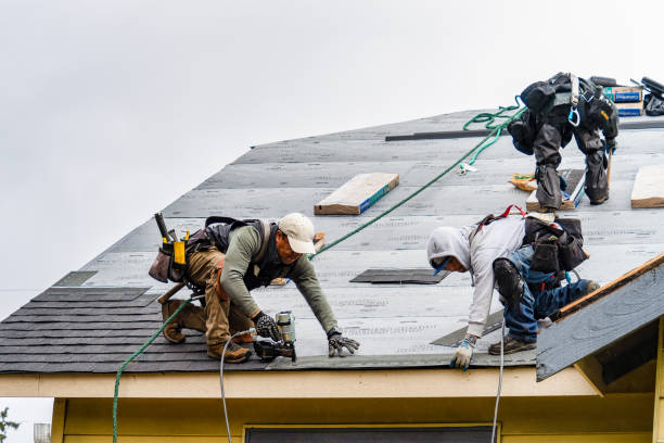 Professional Storm Damage Roof Repair technician working in Sproul, PA
